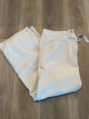 Cherokee scrub Pants size L/XL started out white. Faves=off white now
